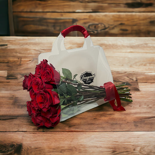 Red roses purse flowers bouquet